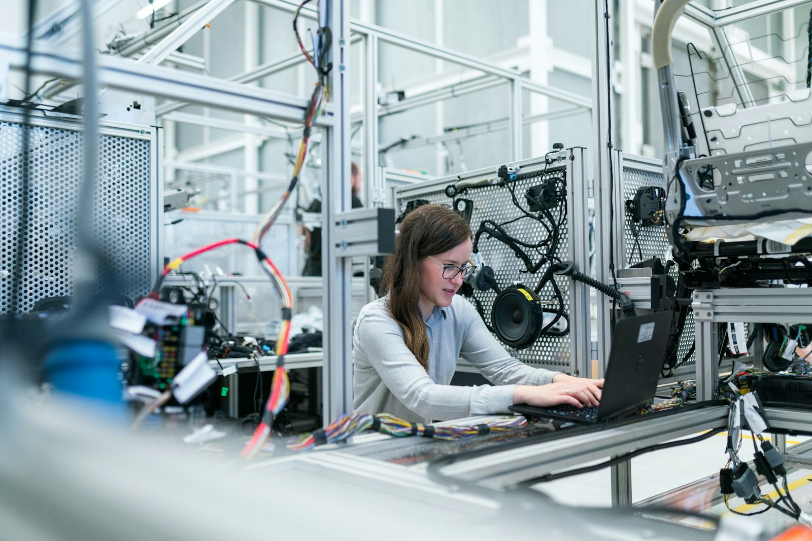 Engineer working on industrial wiring and control equipment